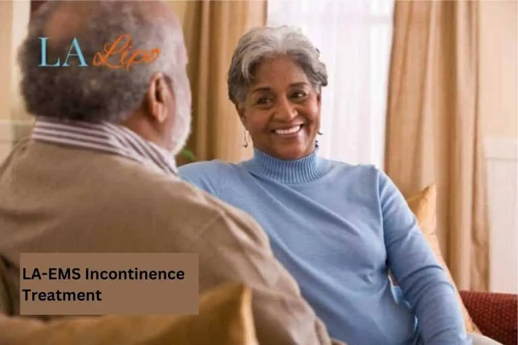 Couple sat smiling at each other - LA-EMS treatment Hedge End