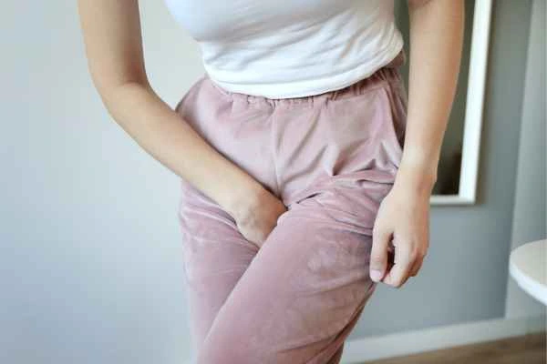 older woman running to the toilet because of urinary incontinence Hedge End